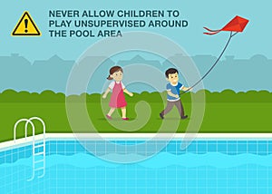 Safety rule for kids. Male and female kids flying kite close to outdoor swimming pool.