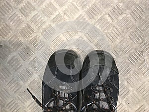 Safety shoes with metal background