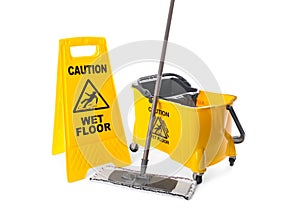 Safety sign with phrase Caution wet floor, mop and bucket on white background. Cleaning service