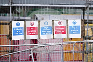 Safety starts here and health safety construction board notice signs where building works are taking place