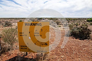 Safety warning sign about the dangers of the opal fields