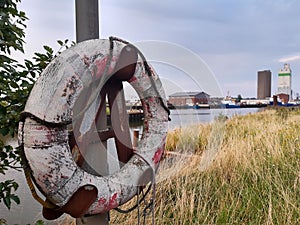 Safety on a water, life ring on blue sea background