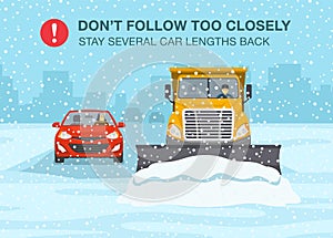 Safety winter driving rule. Snow plow truck is clearing snow away on winter highway. Don`t follow too closely.