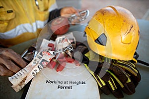 Safety workplace working at height permit book helmet personal locks place on the table