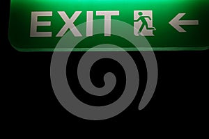 Safety workplaces emergency evacuation exit sign on door way