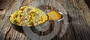 Safron or turmeric flavored bowl of couscous