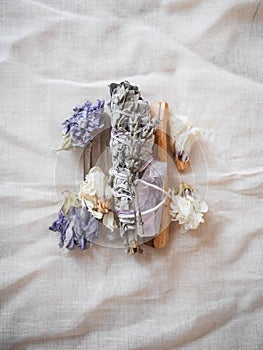 Sage bundle with crystals and flowers
