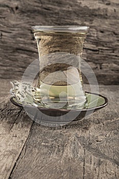 Sage tea on wooden table