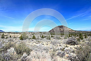 Schonchin Butte Ash Volcano in the Open Sagebrush Landscape of Lava Beds National Monument, Northern California, USA photo