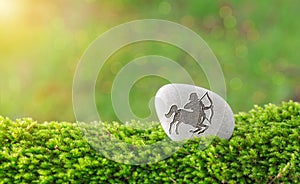 Sagittarius zodiac symbol in stone