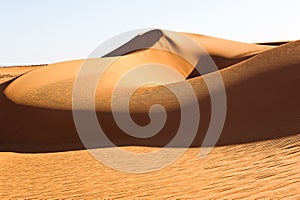 Sahara landscape - dunes in light and shaddow in the Sahara formed and moved by the wind