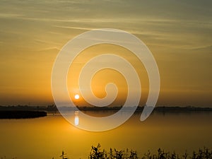 Saharan sunset at lake