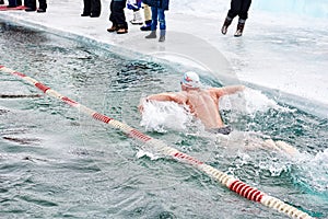 SAHYURTA ,IRKUTSK REGION, RUSSIA - March 11.2017: Cup of Baikal. Winter Swimming. Butterfly