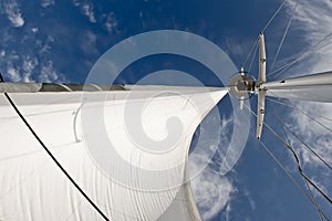 Sail billowing in wind photo