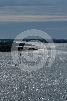 Sail boat in the archipelago evening