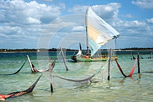 Sail boat and hammocks in Jericoacoara, Brazi