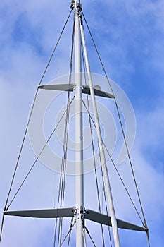 Sail boat mast with spreaders and shrouds