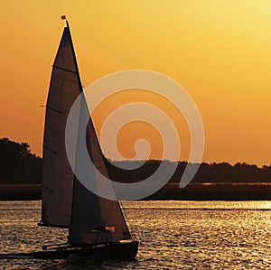 Sail boat at sunset