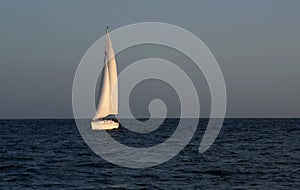 Sail boat at sunset