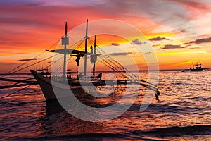 Sail boat at sunset sea, boracay island