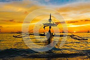 Sail boat at sunset sea, boracay island