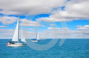 Sail boating on blue water