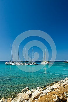 Sail boats docked in beautiful bay, Adriatic sea,