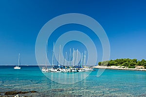 Sail boats docked in beautiful bay, Adriatic sea,