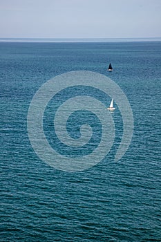 Sail boats in the ocean in Bray