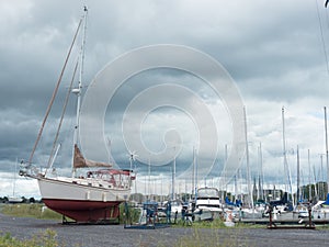 Sail boats and ominous skies