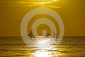 Sail boats at sunset, Boracay Island, Philippines