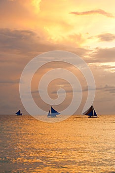 Sail boats at sunset, Boracay Island, Philippines