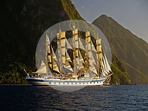 Sail ship near mountain island