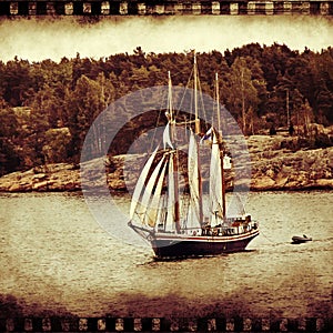 Sail ship. Photo in vintage image style