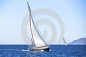 Sail yachts in regatta in open the Sea. Sailing regatta.