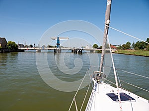 Sailboat approaching bridge - 1 4, Warnsebrug over Johan Frisokanaal, Friesland, Netherlands