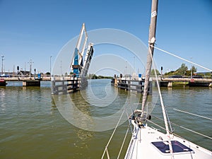 Sailboat approaching bridge - 3 4, Warnsebrug over Johan Frisokanaal, Friesland, Netherlands