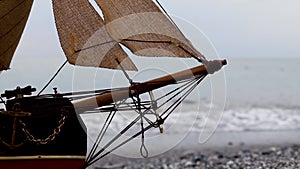 Sailboat on the Background of the Sea. Amazing View of the Blue Waves of the Sea, the Wind Flutters the Sail.