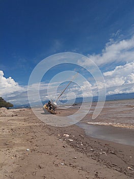 Sailboat on beach after hurricane