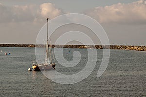 A sailboat moored in a bay