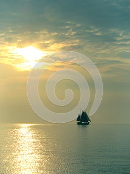 Sailboat at the evening in IJssel sea - IJsselmeer