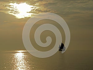 Sailboat at the evening in IJssel sea - IJsselmeer