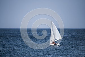 Sailboat gliding over the ocean
