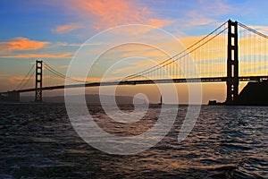 Sailboat and Golden Gate Bridge at Sunset with clouds