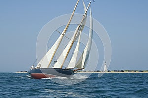 Sailboat and lighthouse