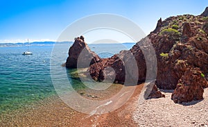 Sailboat on the Mediterranean sea and Aiguille beach in ThÃ©oule sur Mer