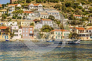 Sailboat moored in the waters of the port of assos kefalonia