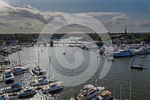 Sailboat moorings and docks on azure blue Spa Creek, in historic downtown Annapolis