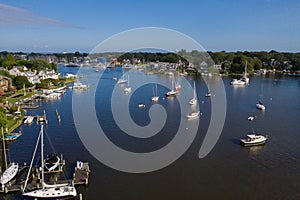 Sailboat moorings and docks on azure blue Spa Creek, in historic downtown Annapolis