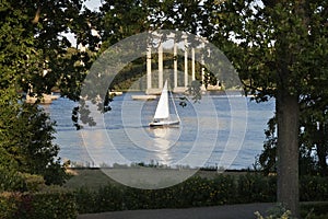 Sailboat Passing a Bridge